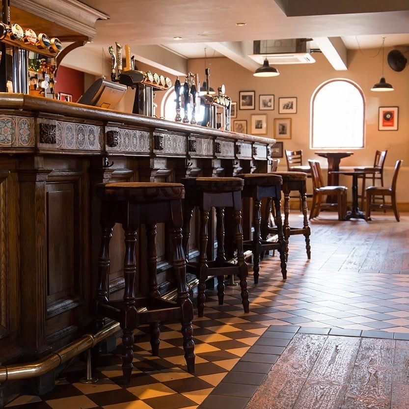 The Charles Bradlaugh bar and tiled floor